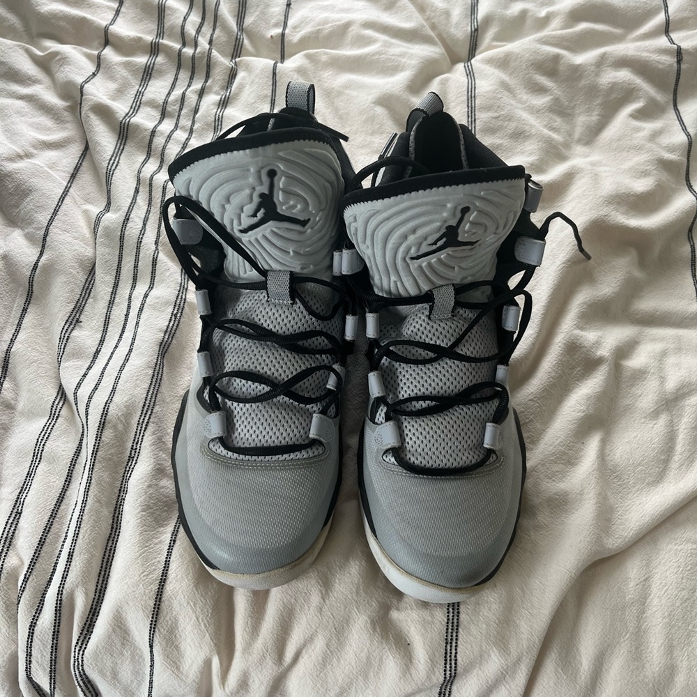 Gray and Black Nike Flight Plate